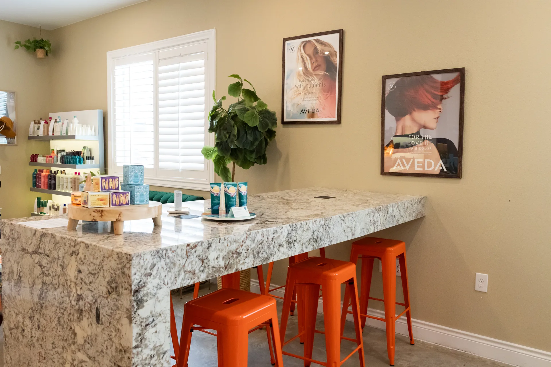 Hart Studios’ color bar and orange seating
